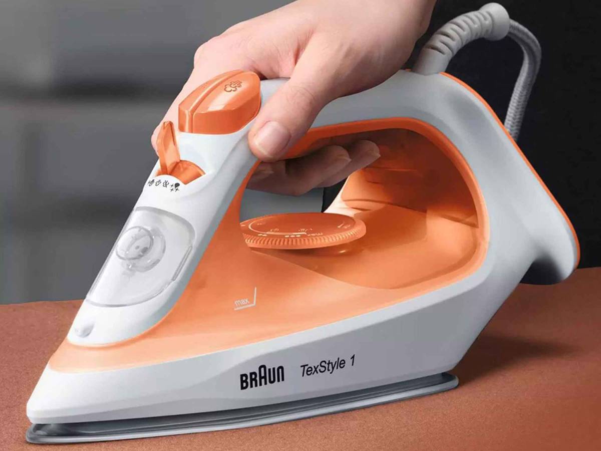 Braun TexStyle 1 Steam Iron SI1009 โ Powerful 1900W Heating Element โข Non-Stick Soleplate Braun TexStyle 1 Steam Iron SI1009 โ Powerful 1900W Heating Element โข Non-Stick Soleplate